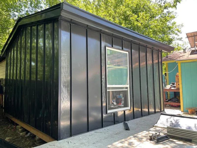 Black standing seam metal wall panels for Metal Roof Installation in University of California-Davis